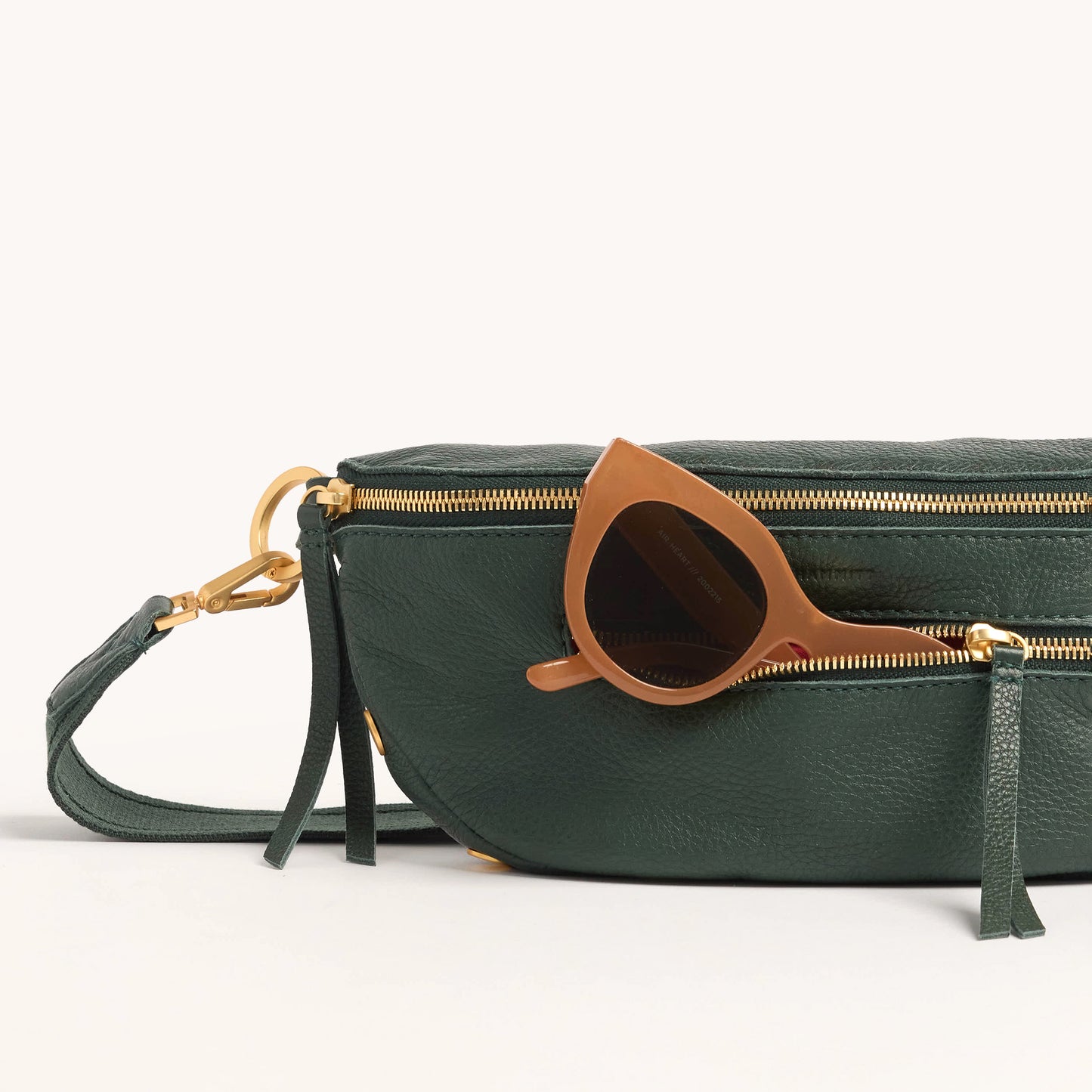 Charles-Crossbody-Med-Green-Room-Pebble-BG-Back-View