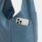 Tom-Zip-Curated-Blue-Back-View